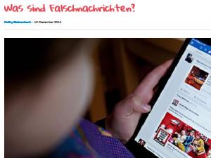 Zum Artikel bei Duda Ein Kind blickt auf ein Smartphone
